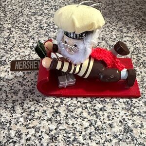 Hershey Chocolate Factory Santa Ornament Figurine with Red Sled NWT